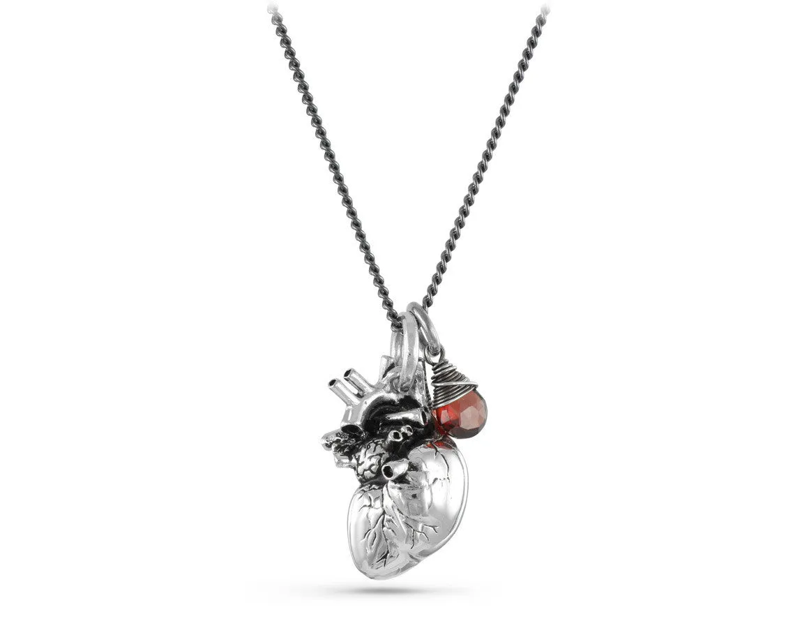 Optimized: Silver Anatomical Heart Necklace with Garnet Gemstone