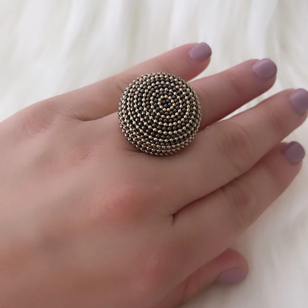 B.E. BLACK AND GOLD ROUND RING