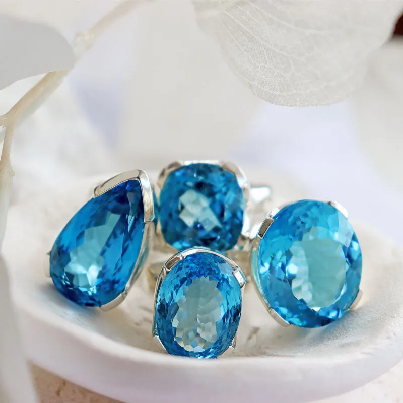 Nila Oval Swiss Blue Topaz Ring