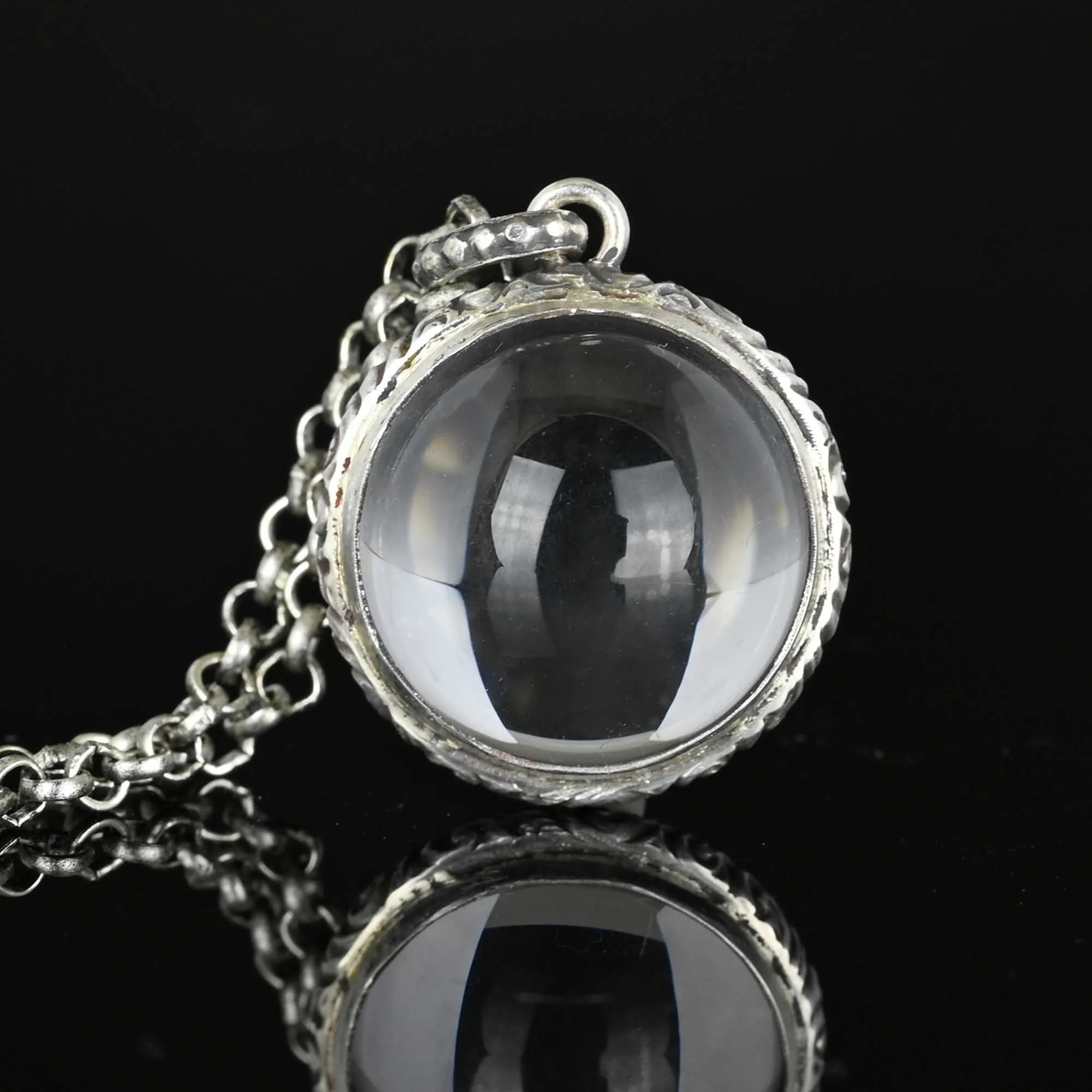 Silver Embossed Pools of Light Rock Crystal Pendant